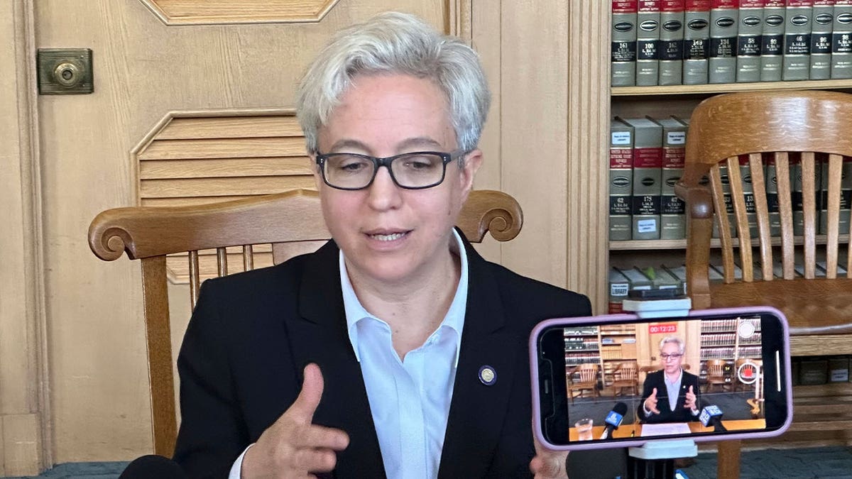 Oregon Gov. Tina Kotek talks about a new state revenue forecast and a Republican walkout in the Oregon Senate during a news conference on May 17, 2023, in Salem. ­