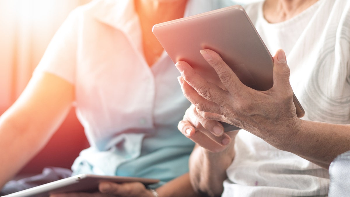 Seniors using tablet