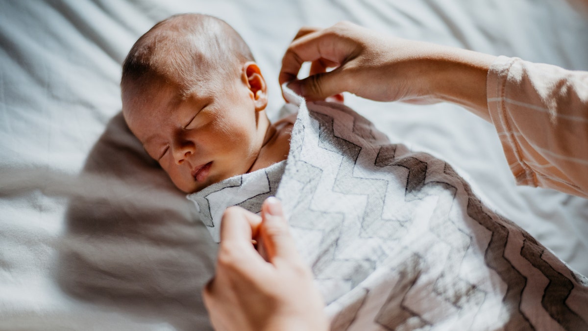 Swaddled baby sleeping