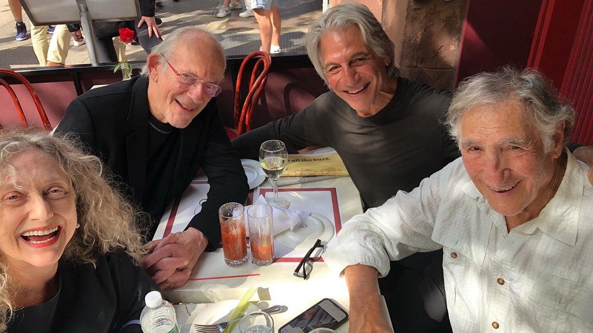 Carol Kane, Christopher Lloyd, Judd Hirsch and Tony Danza smiling at the camera