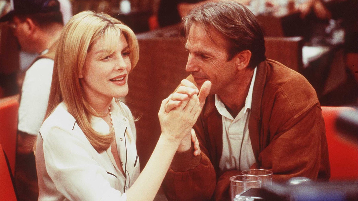 Kevin Costner and Rene Russo in "Tin Cup"