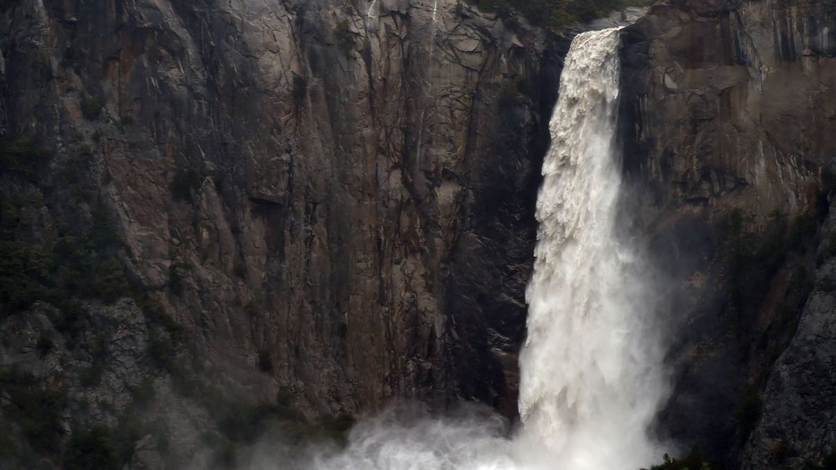 The Bridalveil Fall plummets into Yosemite Valley in Yosemite National Park, California, on April 7, 2018. Three popular campgrounds at California's Yosemite National Park will be temporarily closed starting May 15, 2023, due to potential flooding.