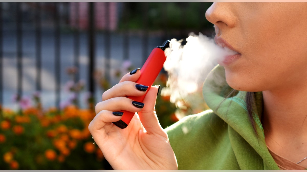 Woman vaping