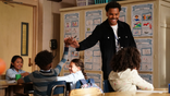 Teacher in a classroom with young students