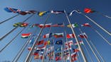 BEIJING, CHINA - DECEMBER 24: A general view of national flags inside the athletes' village for the Beijing 2022 Winter Olympic Games on December 24, 2021 in Beijing, China. The Beijing Winter Olympics will be held from February 4th to February 20th. (Photo by Emmanuel Wong/Getty Images)