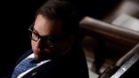 George Santos listens to South Korean president