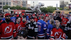 Devils fans mock Rangers supporters outside arena following Game 7 domination