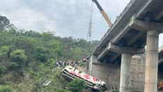 Hindu pilgrim bus skids off bridge into gorge in India killing at least 10, 55 others injured