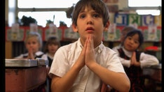 Education Department warns against schools encouraging private prayer, other religious activity
