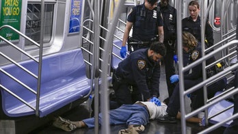 Marine veteran accused in NYC subway chokehold death identified by his lawyer