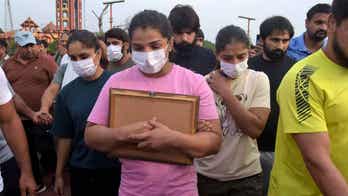 India's top wrestlers hold off on protest against sexual harassment after community leaders intervene