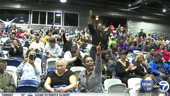 Chicago residents shred local politicians over plans to house illegal immigrants at closed high school