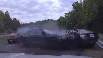Virginia police officer narrowly avoids getting hit by out-of-control BMW