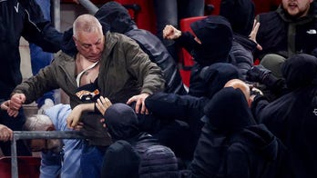 West Ham players jump into stands to defend families after massive brawl erupts at Europa Conference semifinal