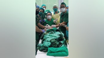 Child is saved by emergency surgery after he swallowed a clothespin spring