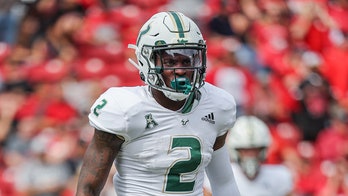 USF running back facing felony domestic battery charge; suspended from team