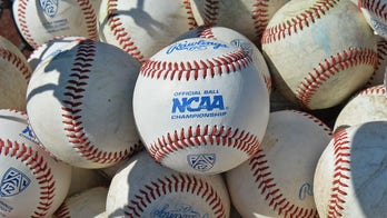 College baseball player performs national anthem on guitar before game