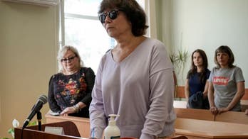 Russian woman convicted and sentenced after leaving derogatory note on Putin's parents' graves