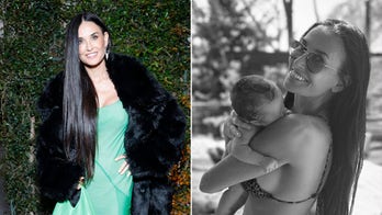 Demi Moore stuns in bikini with her first grandchild