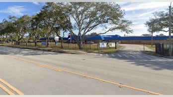 Florida gym teacher charged with reportedly encouraging student locker room fight