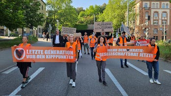 Germany denies chancellor's criticism of climate protestors incited raids
