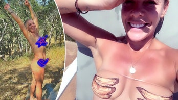 Pink poses nude in the shower, embracing the embarrassing mom label