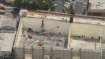 California construction site collapses, trapping workers