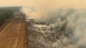 Residents in Western Canada forced to evacuate as out-of-control wildfires threaten communities