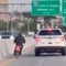 New York Police Department cruiser seen in video swerving dangerously close to moped