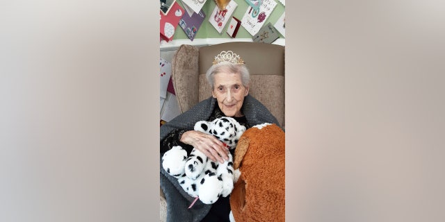 Elderly woman stuffed animal