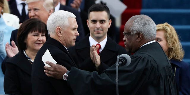 VP Mike Pence sworn in by Justice Clarence Thomas