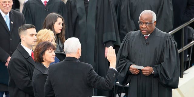 Vice President Mike Pence sworn in by Judge Clarence Thomas