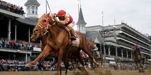 Rich Strike runs across the finish line