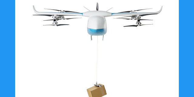 Drone carrying a box flying forward.