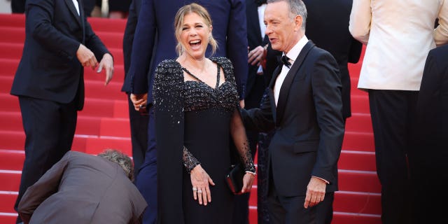 Rita Wilson laughs on red carpet with Tom Hanks