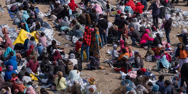 People sitting at the border