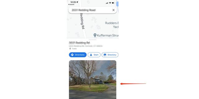 Image of a house and street with red arrow pointing to it on Google Maps