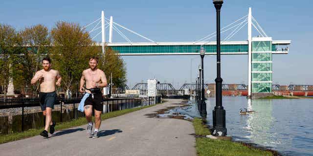 Pair of runners jogging