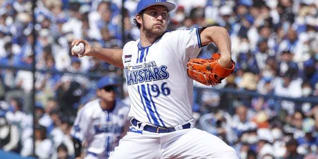 Trevor Bauer pitches for the Yokohama DeNA Baystars