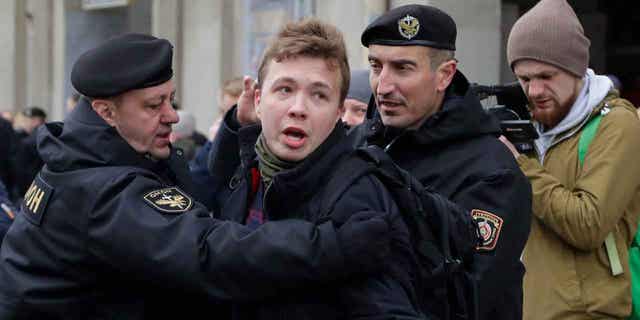 Belarus police arrest journalist Raman Pratasevich,