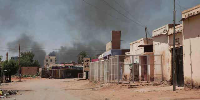 Smoke rises in Khartoum