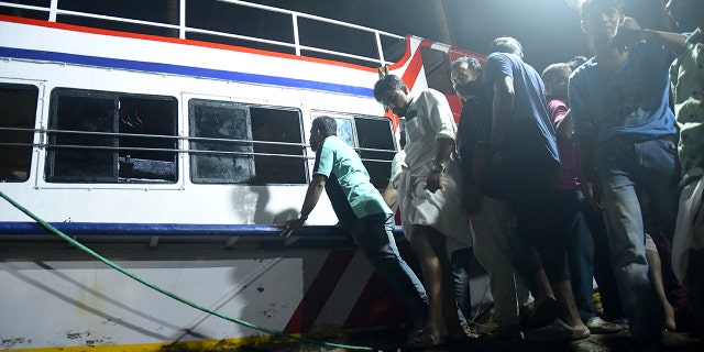 A photo of the capsized boat in the Indian state of Kerala