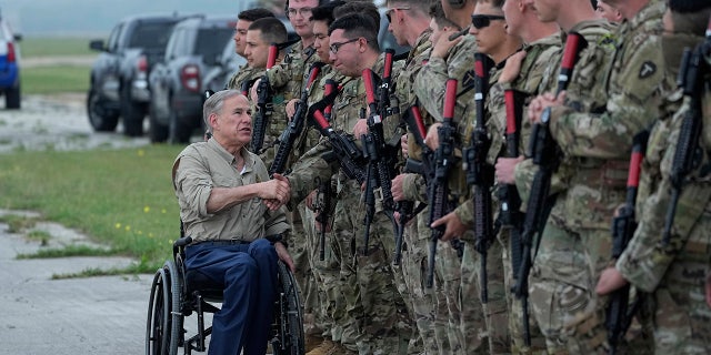 Abbott greets national guard