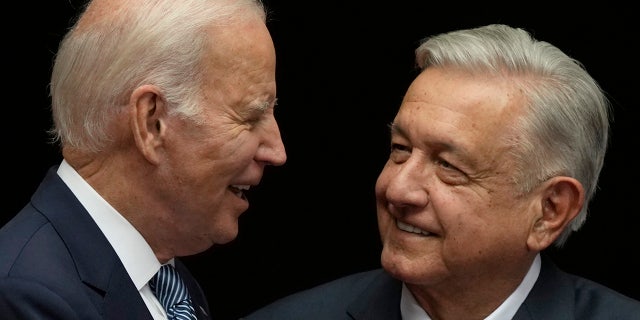 Biden and the president of Mexico smile