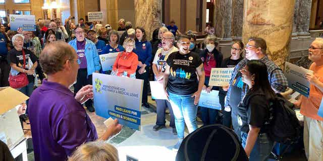 Supporters of a paid family and medical leave bill