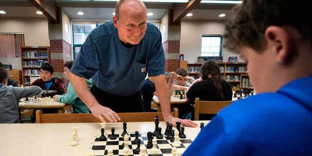 Custodian and chess coach David Bishop