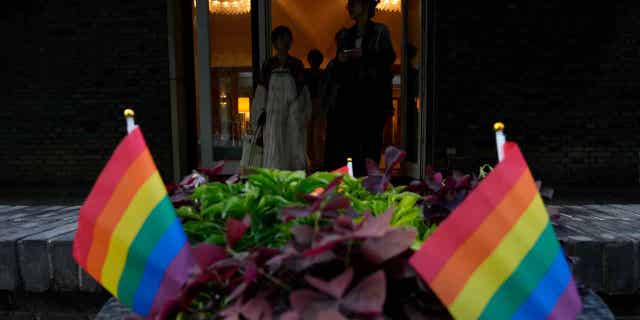 Attendees arrive for the opening ceremony for Diversity Week