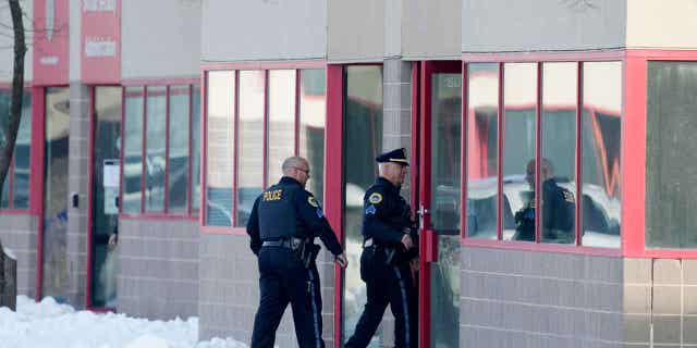 Law enforcement entering high school