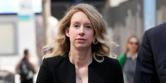 Former Theranos CEO Elizabeth Holmes leaves federal court in San Jose, Calif.,