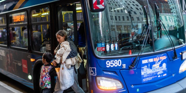 Migrants bused to NYC hotel